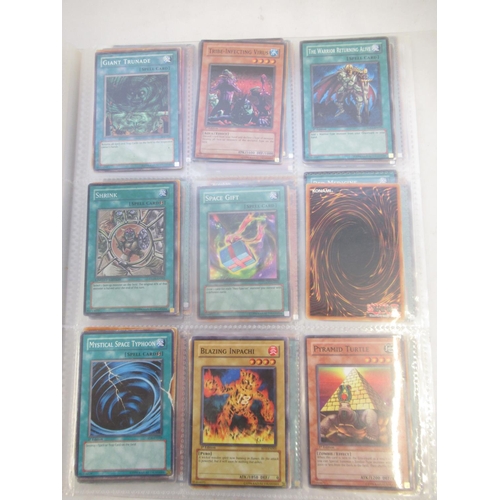 1454 - Collection of Yu-Gi-Oh! trading cards loose and in a folder (approx. 490)