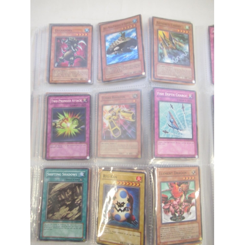 1454 - Collection of Yu-Gi-Oh! trading cards loose and in a folder (approx. 490)