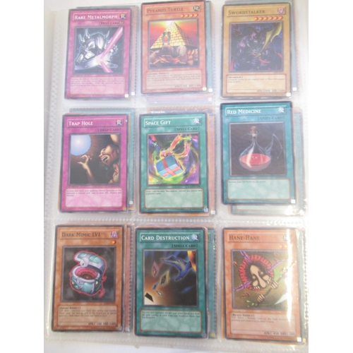 1454 - Collection of Yu-Gi-Oh! trading cards loose and in a folder (approx. 490)