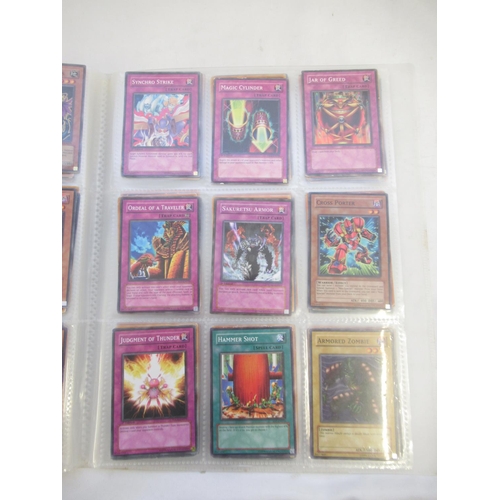 1454 - Collection of Yu-Gi-Oh! trading cards loose and in a folder (approx. 490)