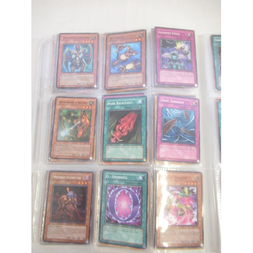 1454 - Collection of Yu-Gi-Oh! trading cards loose and in a folder (approx. 490)