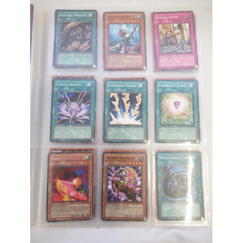 1454 - Collection of Yu-Gi-Oh! trading cards loose and in a folder (approx. 490)