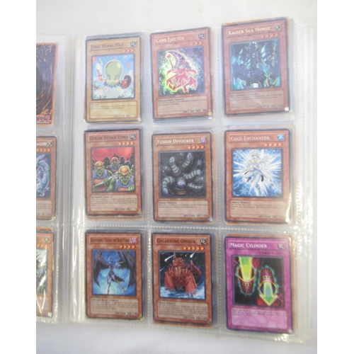 1454 - Collection of Yu-Gi-Oh! trading cards loose and in a folder (approx. 490)