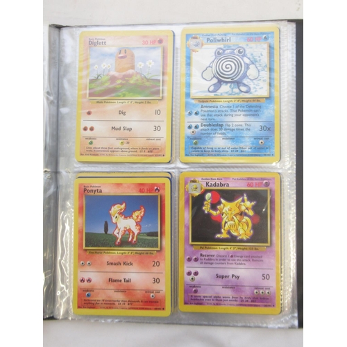 1456 - Pokemon folder cont. trading cards and loose Pokemon trading cards to inc. Dark Charizard, Charmande... 