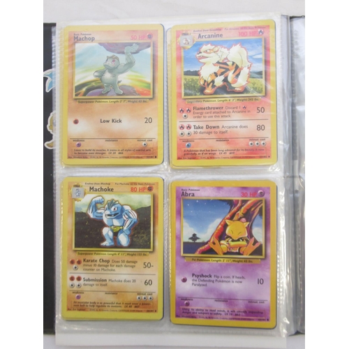 1456 - Pokemon folder cont. trading cards and loose Pokemon trading cards to inc. Dark Charizard, Charmande... 