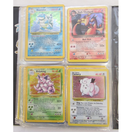 1456 - Pokemon folder cont. trading cards and loose Pokemon trading cards to inc. Dark Charizard, Charmande... 