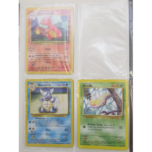 1456 - Pokemon folder cont. trading cards and loose Pokemon trading cards to inc. Dark Charizard, Charmande... 