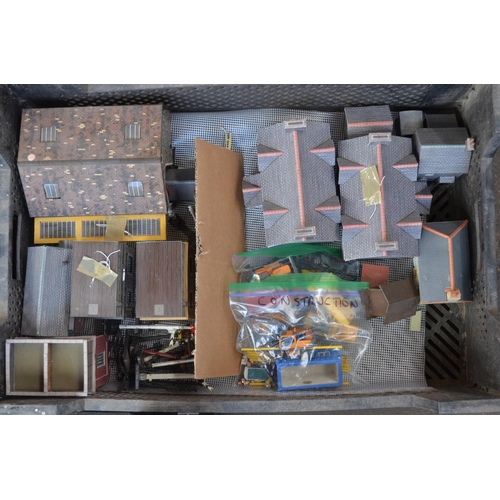 1171 - Eleven crates filled with built up OO/HO gauge railway buildings including card and plastic kit exam... 