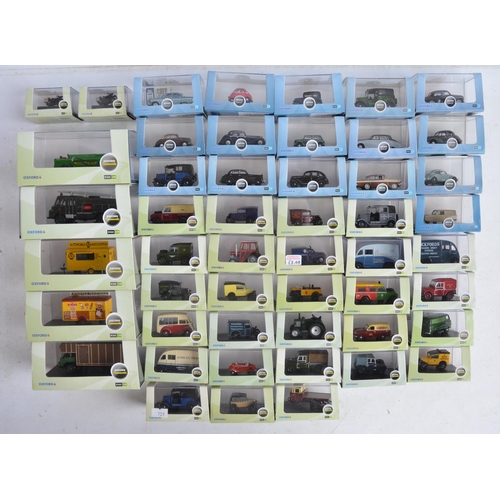 1181 - Fifty boxed 1/76 scale (OO gauge) vehicle models from Oxford Diecast's Commercials and Automobile Co... 