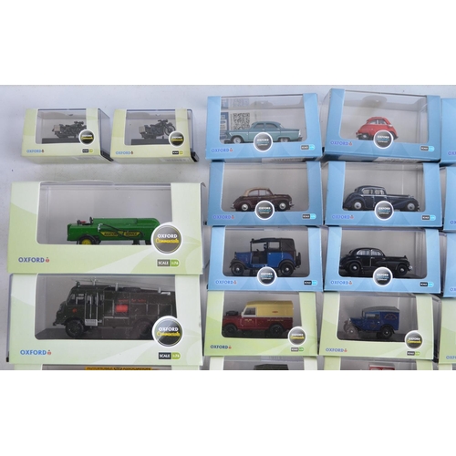 1181 - Fifty boxed 1/76 scale (OO gauge) vehicle models from Oxford Diecast's Commercials and Automobile Co... 