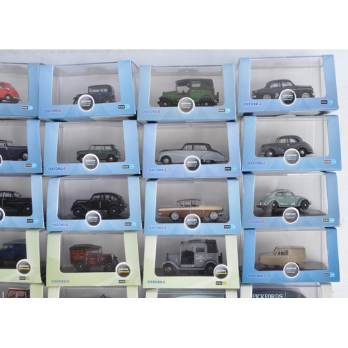 1181 - Fifty boxed 1/76 scale (OO gauge) vehicle models from Oxford Diecast's Commercials and Automobile Co... 