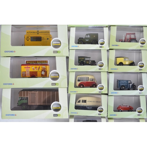 1181 - Fifty boxed 1/76 scale (OO gauge) vehicle models from Oxford Diecast's Commercials and Automobile Co... 