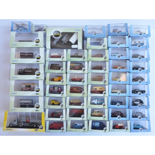 1182 - Fifty boxed 1/76 scale (OO gauge) vehicle models from Oxford Diecast's Commercials, Construction and... 