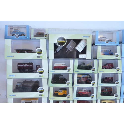 1182 - Fifty boxed 1/76 scale (OO gauge) vehicle models from Oxford Diecast's Commercials, Construction and... 