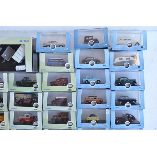 1182 - Fifty boxed 1/76 scale (OO gauge) vehicle models from Oxford Diecast's Commercials, Construction and... 