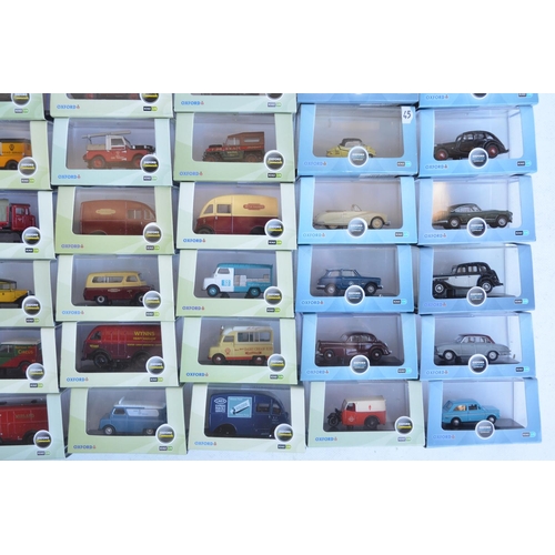 1182 - Fifty boxed 1/76 scale (OO gauge) vehicle models from Oxford Diecast's Commercials, Construction and... 