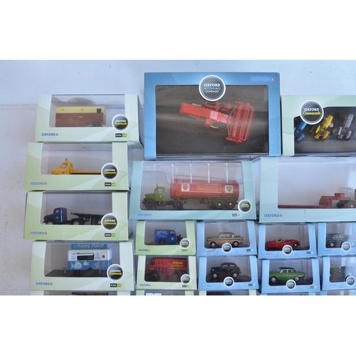 1183 - Fifty boxed 1/76 and 1/87 scale (OO/HO gauge) vehicle models to include 48x from Oxford Diecast's Co... 