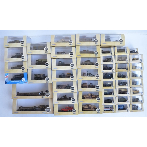 1186 - Forty eight 1/76 scale (OO gauge) diecast vehicles from Oxford Diecast Military range, models genera... 