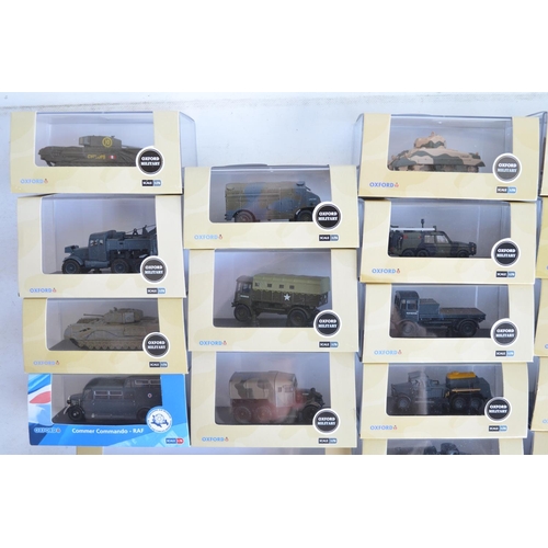 1186 - Forty eight 1/76 scale (OO gauge) diecast vehicles from Oxford Diecast Military range, models genera... 