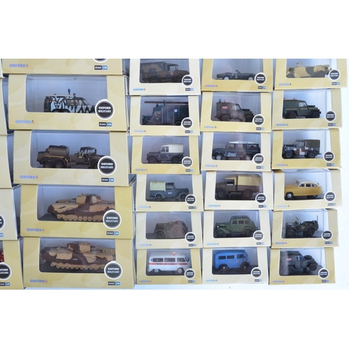 1186 - Forty eight 1/76 scale (OO gauge) diecast vehicles from Oxford Diecast Military range, models genera... 