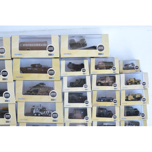 1186 - Forty eight 1/76 scale (OO gauge) diecast vehicles from Oxford Diecast Military range, models genera... 