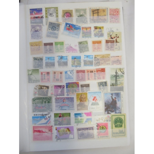 833 - 5 folders cont. c20th stamps from India, France, China, Poland, Ethiopia, Egypt, Brazil, etc.