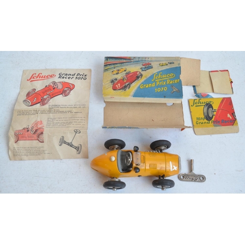 1207 - Vintage Schuco 1070 metal Grand Prix Racer (made in US zone, Germany) in good working order with wor... 