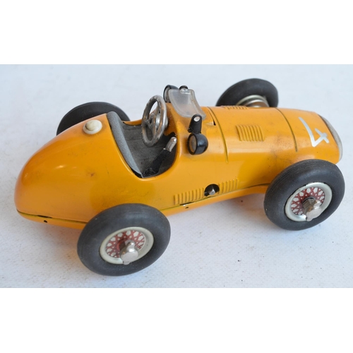 1207 - Vintage Schuco 1070 metal Grand Prix Racer (made in US zone, Germany) in good working order with wor... 