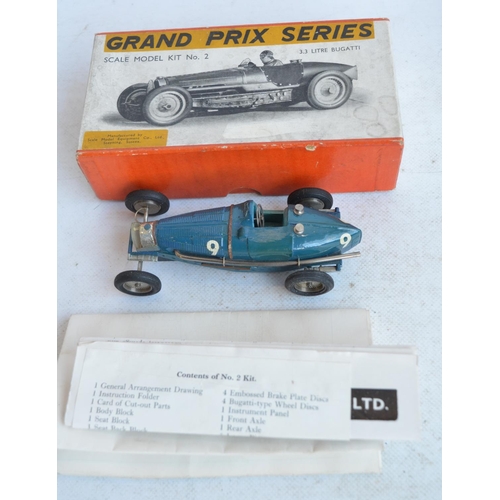 1207 - Vintage Schuco 1070 metal Grand Prix Racer (made in US zone, Germany) in good working order with wor... 