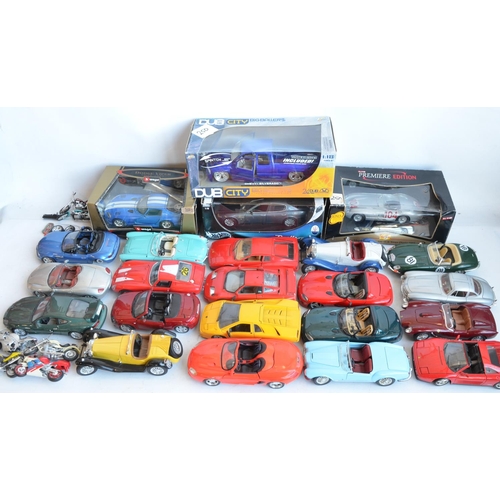 1225 - Collection of mostly 1/18 scale diecast model cars from Maisto, Burago, Mira etc. to include 4 boxed... 