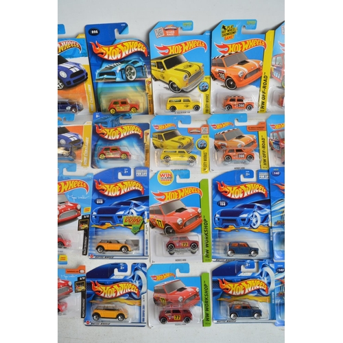 1229 - Thirty six factory sealed/unopened Hot Wheels Morris Mini diecast models with 18 different styles of... 