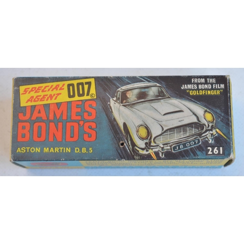 1231 - Vintage boxed Corgi Toys 261 James Bond gold coloured Aston Martin DB5 in full working order with bo... 