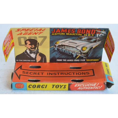 1231 - Vintage boxed Corgi Toys 261 James Bond gold coloured Aston Martin DB5 in full working order with bo... 