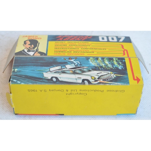 1231 - Vintage boxed Corgi Toys 261 James Bond gold coloured Aston Martin DB5 in full working order with bo... 