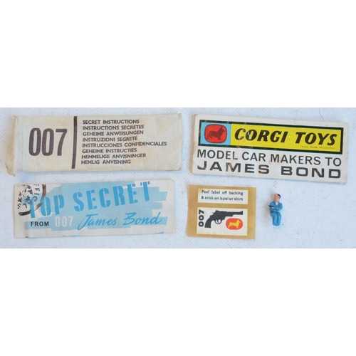 1231 - Vintage boxed Corgi Toys 261 James Bond gold coloured Aston Martin DB5 in full working order with bo... 