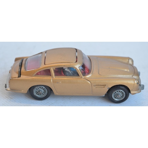 1231 - Vintage boxed Corgi Toys 261 James Bond gold coloured Aston Martin DB5 in full working order with bo... 