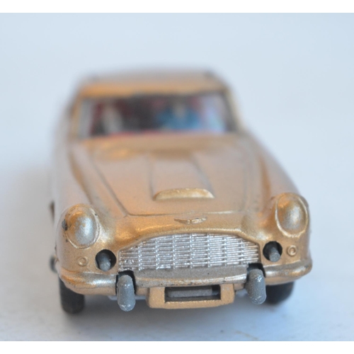 1231 - Vintage boxed Corgi Toys 261 James Bond gold coloured Aston Martin DB5 in full working order with bo... 