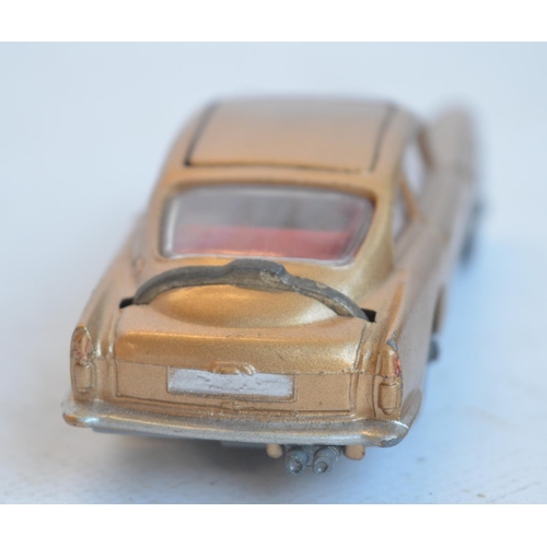 1231 - Vintage boxed Corgi Toys 261 James Bond gold coloured Aston Martin DB5 in full working order with bo... 