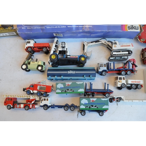 1233 - Collection of playworn diecast models from Corgi, Siku, Burago etc including a vintage friction powe... 