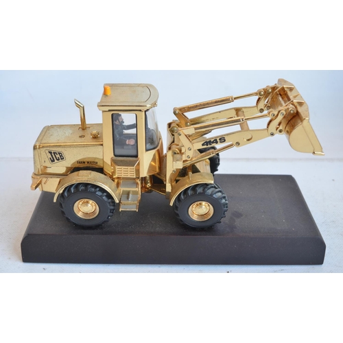 1235 - Collection of JCB themed models to include 1/32 scale Britain's licence built gold plated 414S Farm ... 