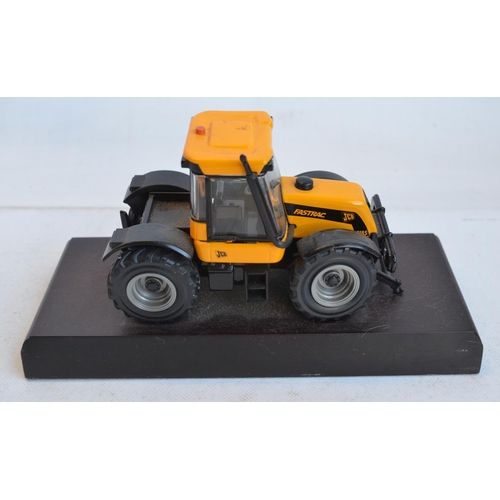 1235 - Collection of JCB themed models to include 1/32 scale Britain's licence built gold plated 414S Farm ... 