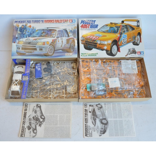 1238 - Collection of car and motorbike model kits to include 1/24 scale Tamiya Peugeot 405T16GR 1990 Paris-... 