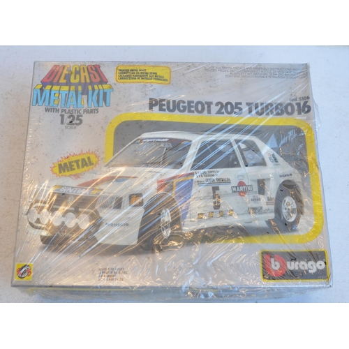 1238 - Collection of car and motorbike model kits to include 1/24 scale Tamiya Peugeot 405T16GR 1990 Paris-... 