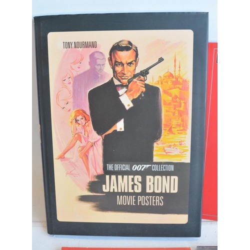 1245 - Collection of James Bond ephemera to include four pictures (2x Osborne & Allen Ltd double DVD pictur... 