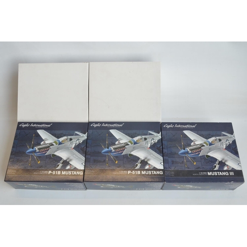 1257 - Three boxed 1/48 scale diecast North American P-51 Mustang models from Eagles International, models ... 