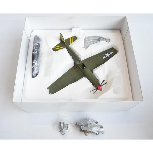 1257 - Three boxed 1/48 scale diecast North American P-51 Mustang models from Eagles International, models ... 