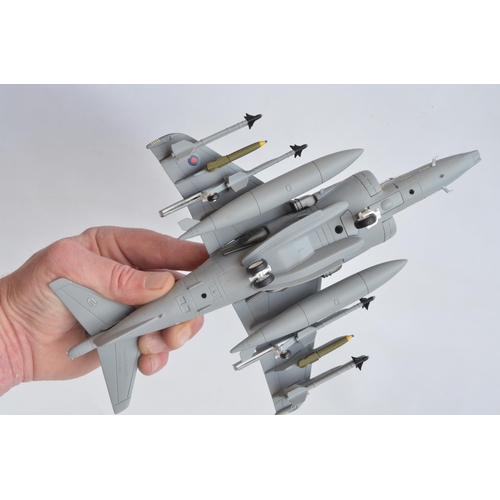 1266 - Two 1/48 scale diecast fast jet models from The Armour Collection to include an RAF Harrier GR7 (mod... 