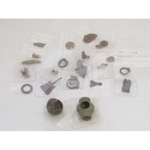 54 - Small collection of metal detectorist finds to inc. rings, brooches, clasps, etc. and a badge for 'F... 