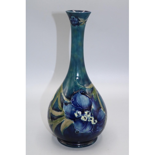 697 - William Moorcroft, Late Florian bottle form vase, H27.5cm, professionally restored