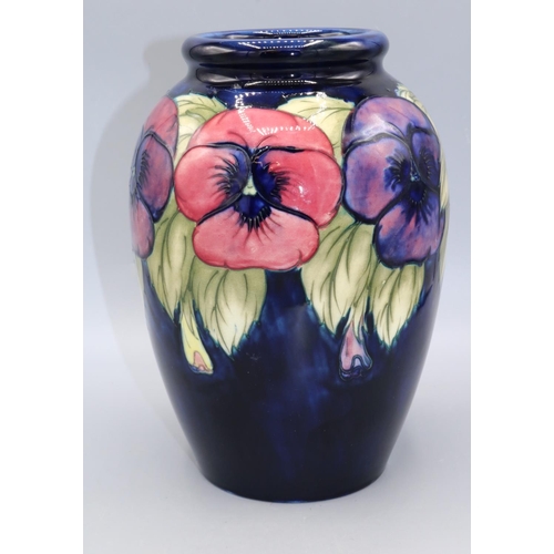 716 - Moorcroft Pottery, large Pansy pattern ovoid form vase, red and purple flowers on dark blue ground, ... 